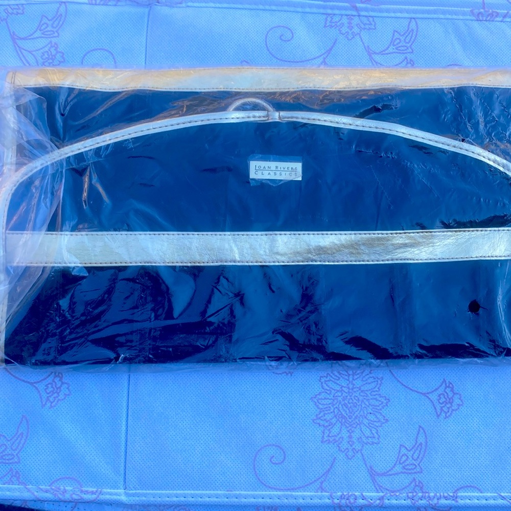 74 pockets 36 loops holds 20 pounds brand new